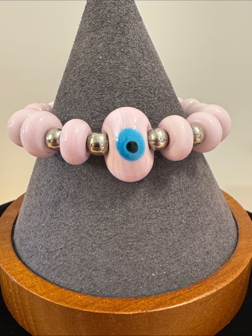 Pale pink ceramic beaded evil eye bracelet